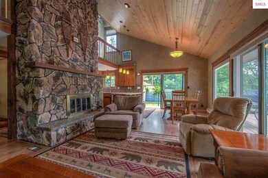 Great room with a nice rock fireplace.