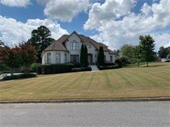 This home sits on a gorgeous corner lot with lots 