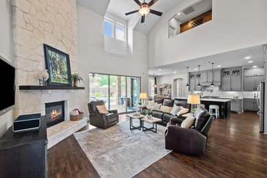 Our first look at the beautiful open concept living/kitchen. Tons of natural light!