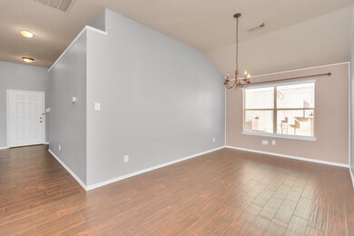 Dining room is open to the kitchen and features in