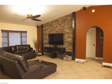 Living room has an added wall accent with built in