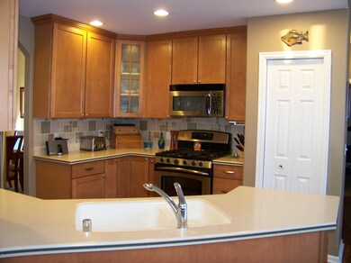 Kitchen with Corian Counter tops
