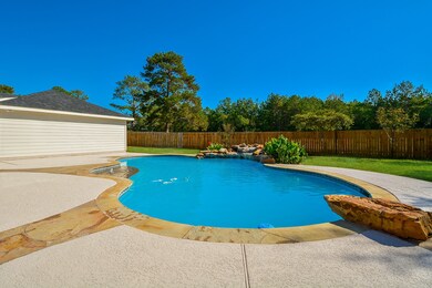 The beautiful tree-line sure beats looking at other neighboring roof-tops! It is serene and private!