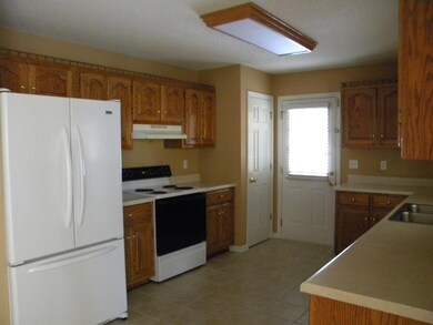 Kitchen has lots of cabinets