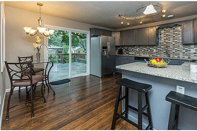 Kitchen. New patio door provides fantastic natural