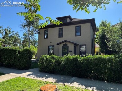 Traditional style home featuring stucco siding