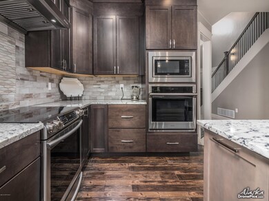Tiled Backsplash w Wall Oven & Blt In Mi