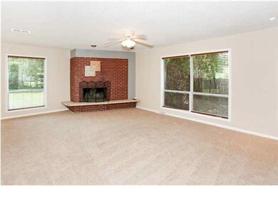 Notice the Living Room's new Pella windows that dr