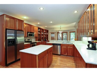 All appliances stay. Natural cherry cabinets makes