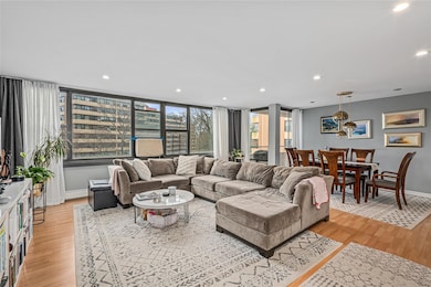 Living Room with Smooth Ceilings and Hi-Hats.