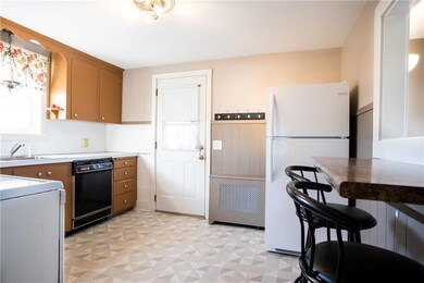 The kitchen is located next to the...
