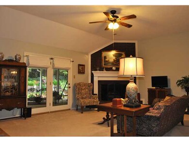 The Living Room has a high ceiling and lots of lig
