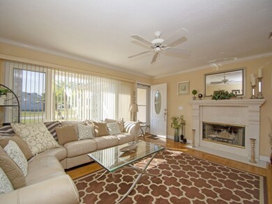Relax in the living room by your fireplace too!