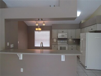 Kitchen viewed from Great Room.  Entertaining is E