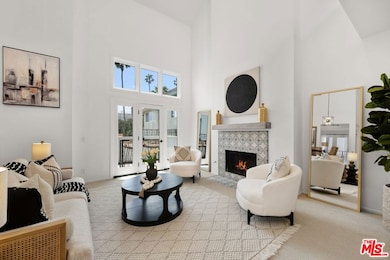 Living room w/ west facing bal