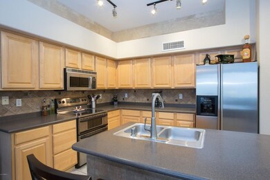 Kitchen - island & stainless appliances
