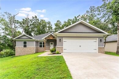 Located on a corner lot on a quiet side street with a North facing front door. Close to the Back 40 Loop Trailhead, Metfield Park & Blowing Springs.