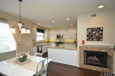 Casual dining area open to family room and kitchen