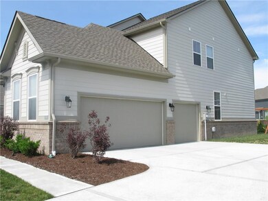 Very Large Driveway/Parking Area Entering into 3 Car Attached Garage.