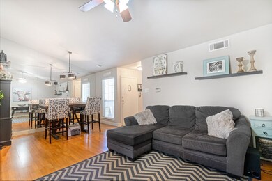 Living room featuring hardwood / wood-style floori