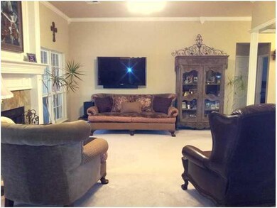 Living Room. Large windows looking out to private back area backing up to wilderness. So beautiful in summer