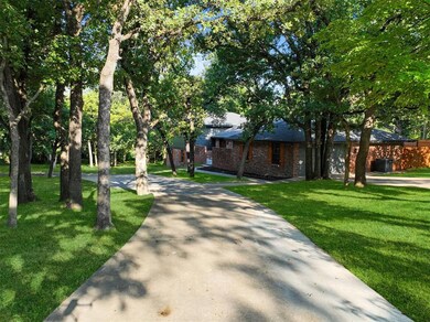 View of property's community with a yard