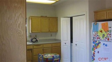 Washer and dryer hookups off kitchen......could be