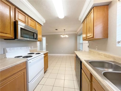 View of Kitchen and Dining Area.