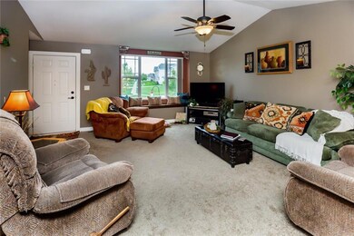 Living area with large windows to watch the birds.