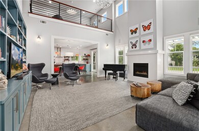 20 ft ceilings and custom built-ins in the spacious living area.