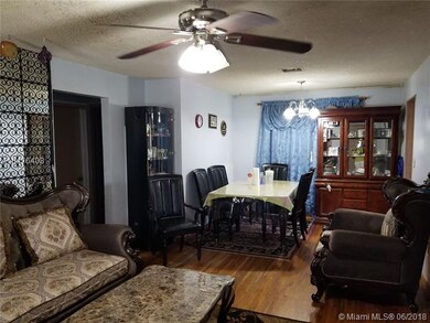 Dining Room - notice Hard Wood Floors.