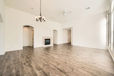 Living Room with 12' Ceilings and Fireplace