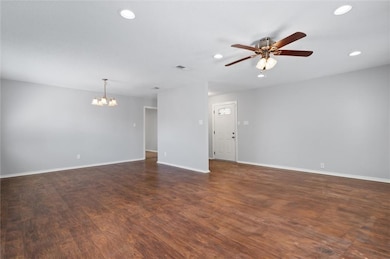 Unfurnished living room with recessed lighting, da