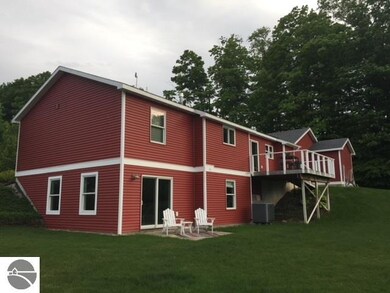 7562 E Meadows Dr, Cedar, MI 49621 - photo 4