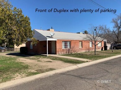 Side of Duplex with plenty of parking