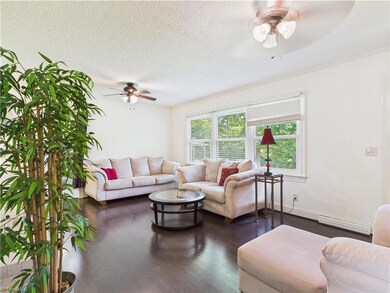 Nice den on the back of the house with a fireplace to cozy up to in the winter.