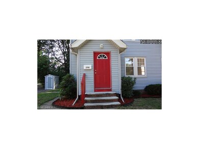 Small storage shed included