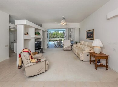 Living room with slider to lanai/pool