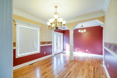 Beautiful formal dining room with a large window
