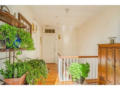 Entry. Common staircase leads to condo entrance.