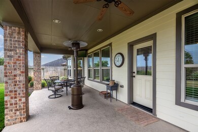 A lovely large covered back porch to entertain and enjoy the outdoors.