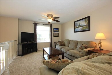This alternate view of the living room gives a lit