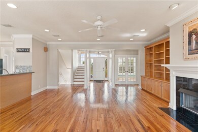 Living room with built-ins and gas fireplace