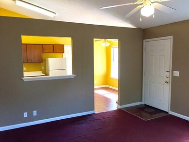 View from the living room into the kitchen.