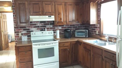 Kitchen has tile floors, new...