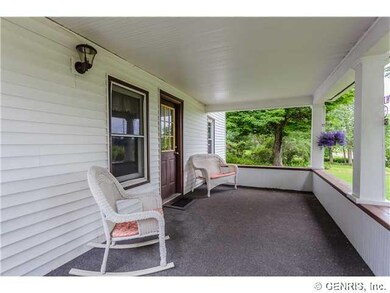 Porch - Open. Covered open front porch stretches t