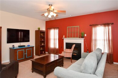 Cozy den with gas log fireplace