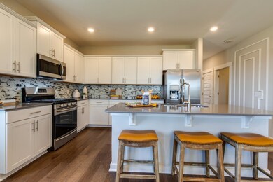 Beautiful quartz counter tops, ceramic backsplash and all kitchen appliances included! Colors will vary*
