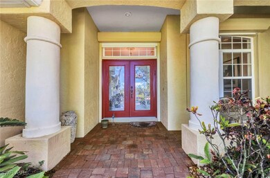 View of exterior entry featuring french doors and