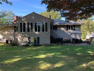 Views of the sunroom and stone patio...